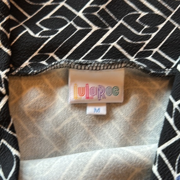 Never worn Lularoe skirt . Lots of stretch - Picture 2 of 3